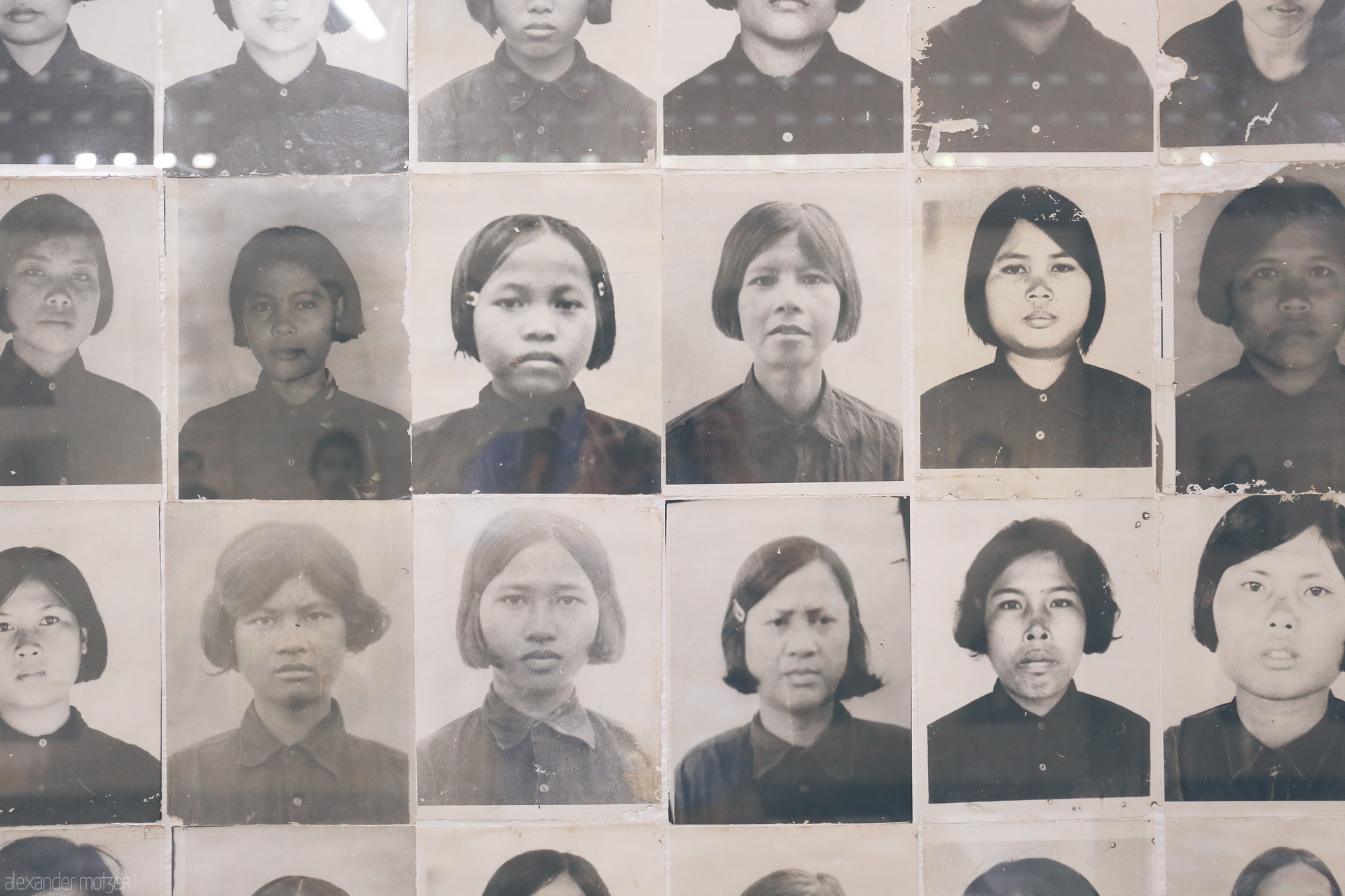 Foto von Portraits from Tuol Sleng Genocide Museum, Phnom Penh—silent witnesses bearing Cambodia's tragic Khmer Rouge history.
